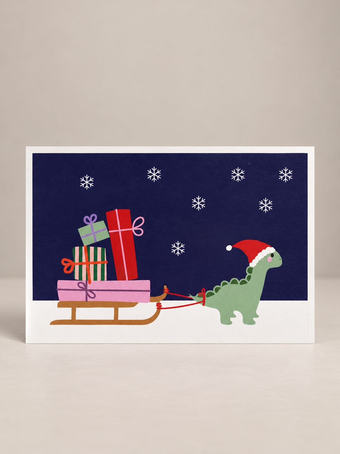 postkarte ettics STUDIO - dino with presents